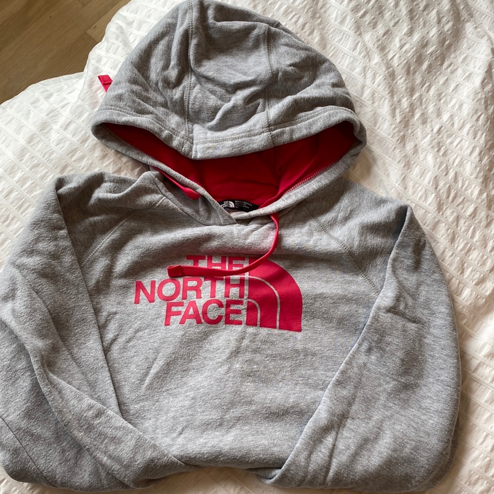 The North Face women’s hoodie. Pink and grey. Worn a few times. No stains